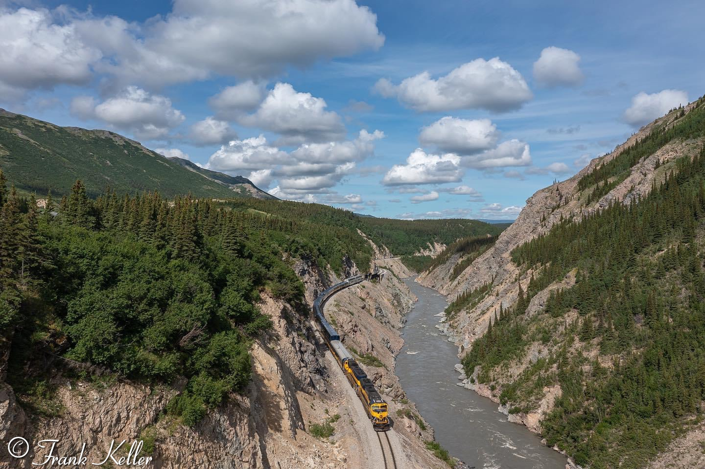 The Denali Star exits the tight confines of Healy Canyon on a beautiful summer day in the Last Frontier.