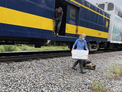 Curt and Renae unloading the baggage car